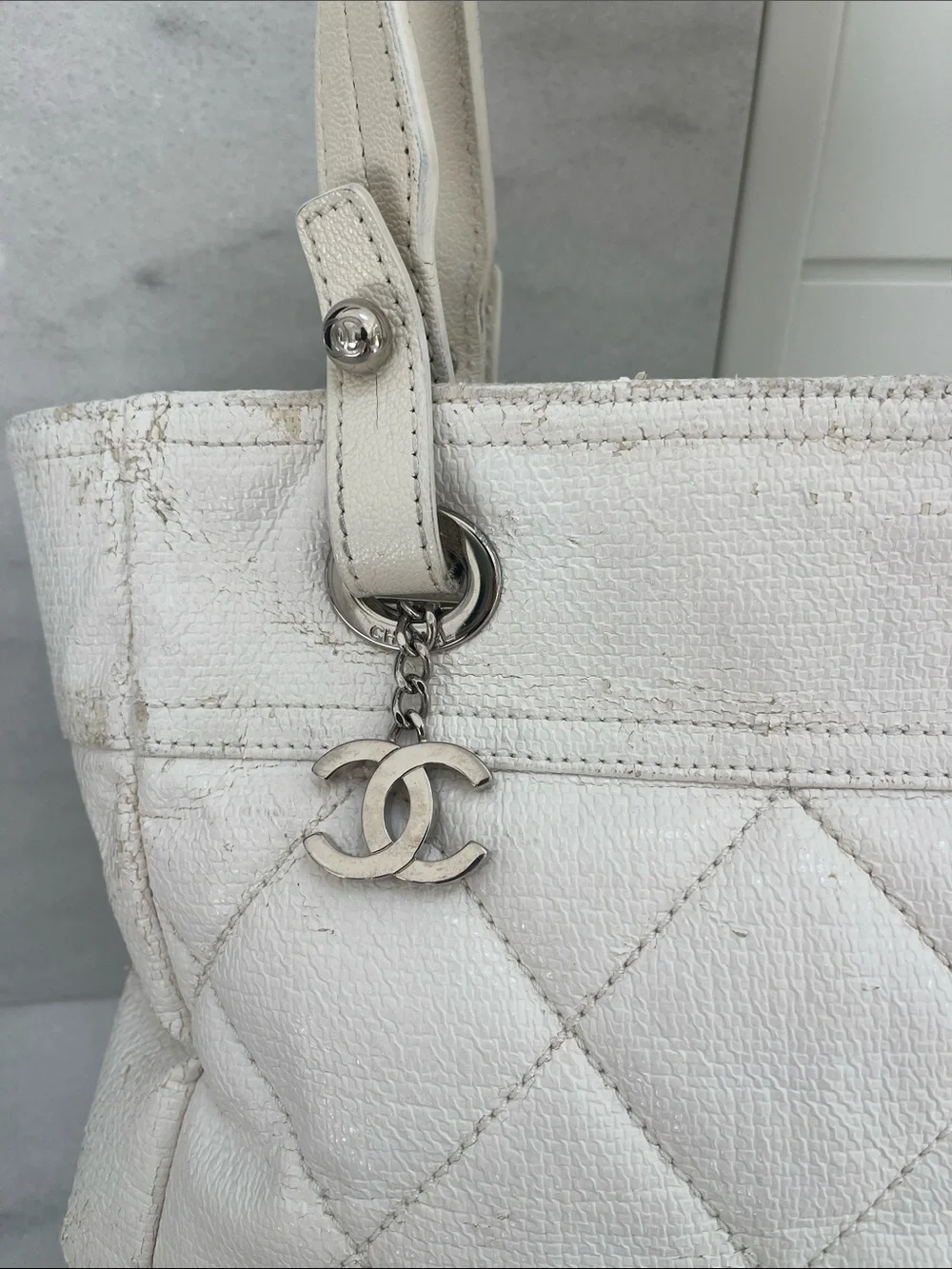 Chanel Paris Biarritz White Tote Bag Silver Charm Hardware Guaranteed Authentic